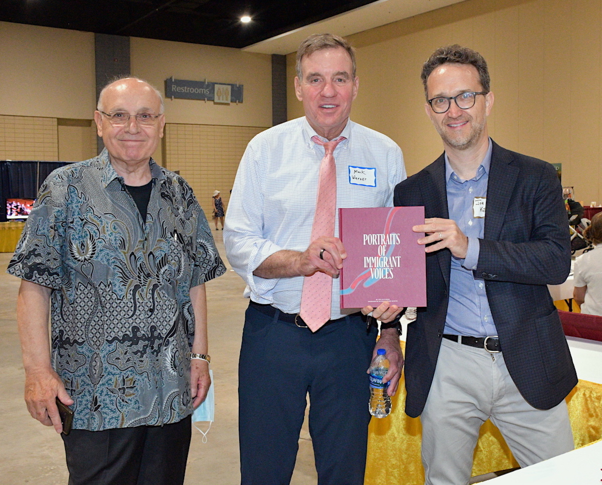 Senator Mark Warner buys a book from us at the AASoCV Asian Festival